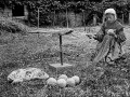 thumbnail Young Girl Making Balls of Linen